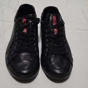 Prada Men's Black Leather Sneakers with Red Accent